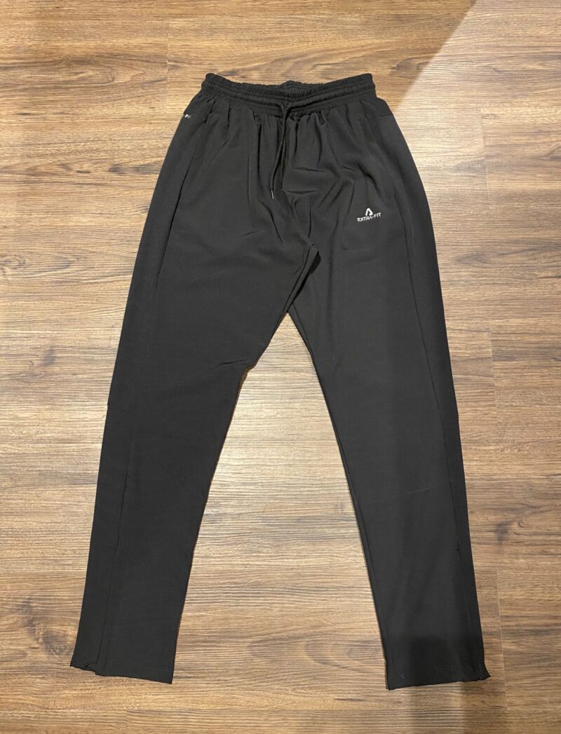Pantalón rompeviento EXTRA FIT